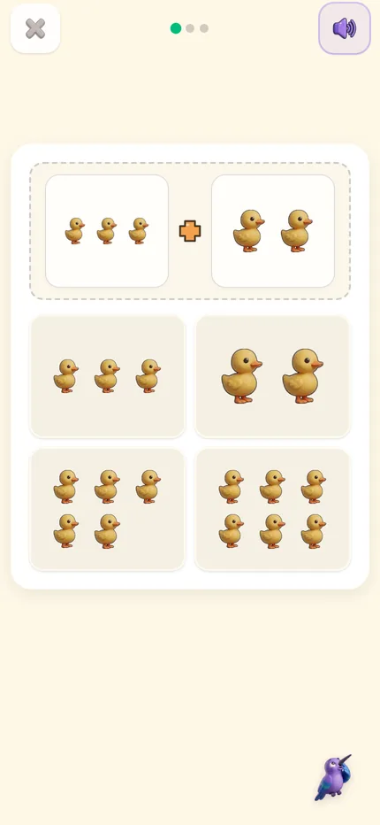 A numbers exercise on a phone: three ducklings plus two, with four possible answers to tap.